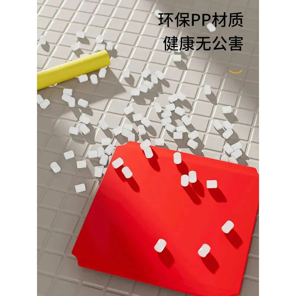 A red dustpan rests on a tiled floor covered with white debris, while a yellow broomstick stands ready in the top left corner. Chinese text appears in the upper right corner, similar to labels on the Indoor Climbing Frame Set for Kids: Slide, Swing & Sensory Play Equipment.