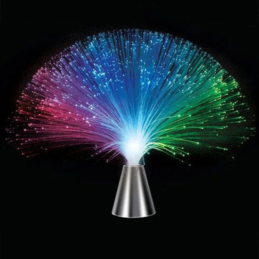 The Multicolor LED Fiber Optic Night Light features a metallic base showcasing a vibrant fan of colors against a black backdrop, smoothly transitioning through red, blue, and green. Battery-powered for convenience, it creates an enchanting starry sky in any room. Perfect for weddings and holidays.