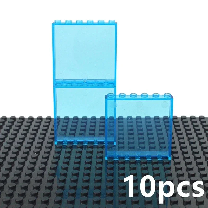 Two clear blue 1x6 building blocks from the MOC Transparent Bulk Brick Set stand on a black baseplate, compatible with Lego. Perfect for any brick collection. 10pcs is displayed in white at the bottom right corner.