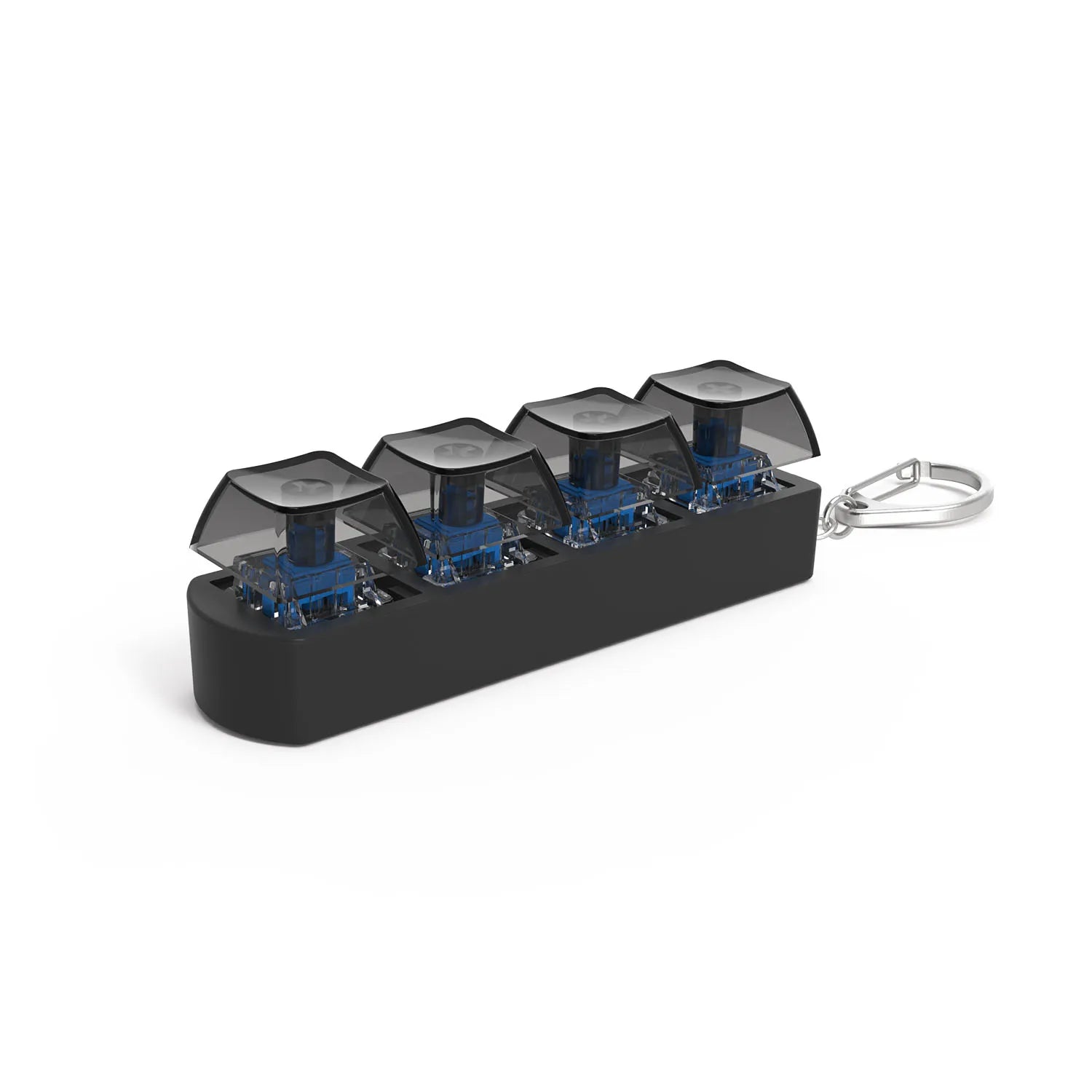 The 4Keys Finger Button Anti Stress Toy is a clear black keychain with four transparent mechanical keyboard keycaps, each protected by a clear cap, designed for stress relief. Includes a metal keyring for easy attachment.
