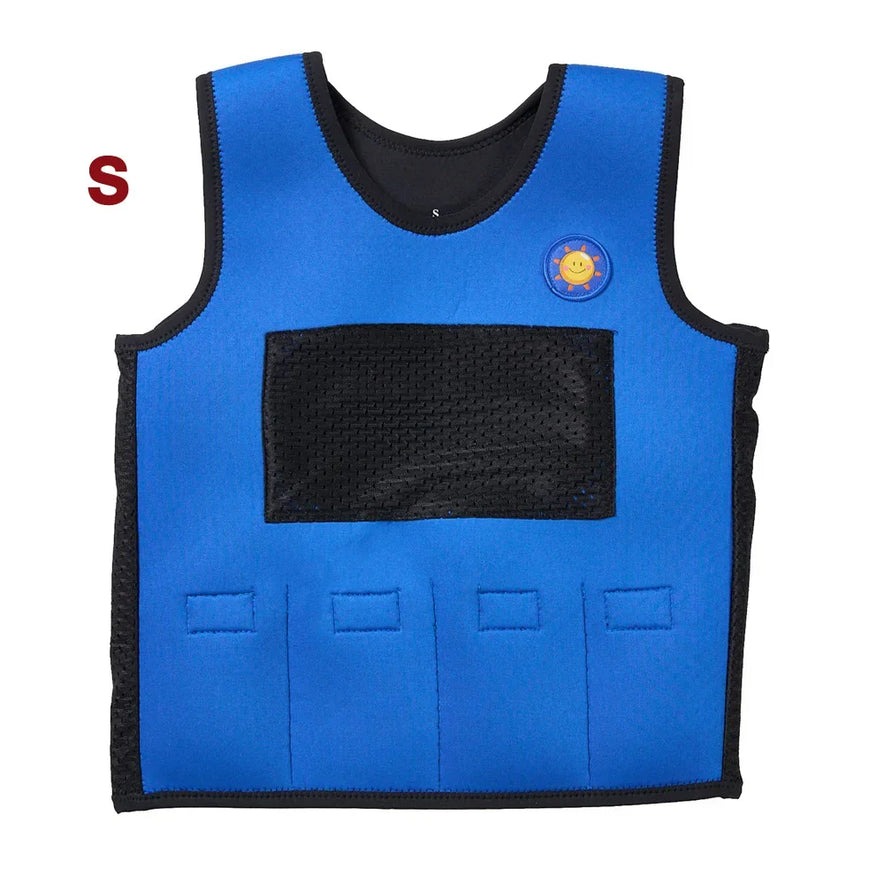 Blue kids weight vest with a black mesh pocket, sun badge, and four square weights. Provides stress relief and emotional support. Size S marked in red at the top left corner.