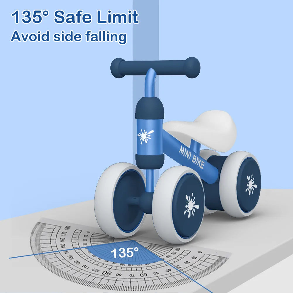 A blue and white Baby Balance Bike Ride On Toy for 1 Year Old Boys and Girls is shown tilted at 135° on a protractor, with text 135° Safe Limit and Avoid side falling, showcasing its stable, anti-drop design for toddlers aged 10-24 months.