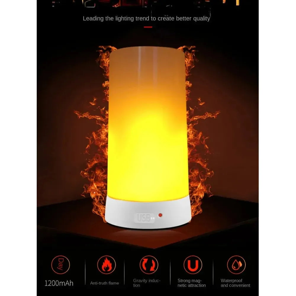 The Simulated Flame LED Night Light emits a bright yellow-orange glow resembling a real flame, sitting on a white base. The background features fiery patterns with text highlighting anti-rush flame features, gravity induction, and its waterproof design for versatile usage.