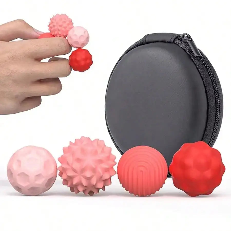 A hand holds two 4Pcs Red Silicone Magnetic Balls for stress relief, ideal for calming restless hands and anxious minds, with four differently textured balls and a round black zippered carrying case in the background.