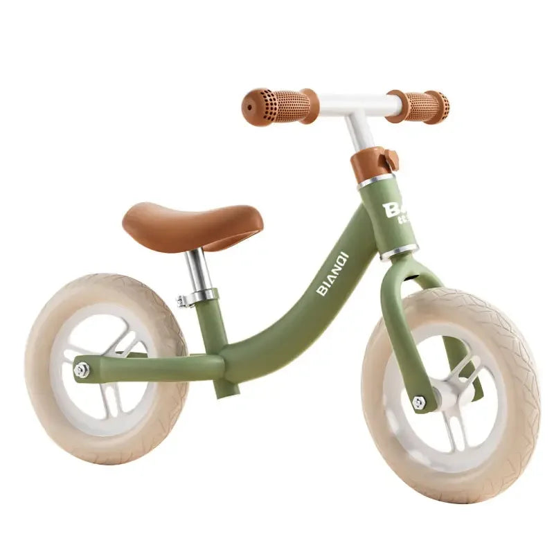 The Magnesium Alloy Toddler Balance Bike in green features a brown seat and handlebars, 12-inch wheels for easy maneuvering, white tires, and clear branding on the frame. Its perfect for kids ages 3-12 and is set against a simple white background.