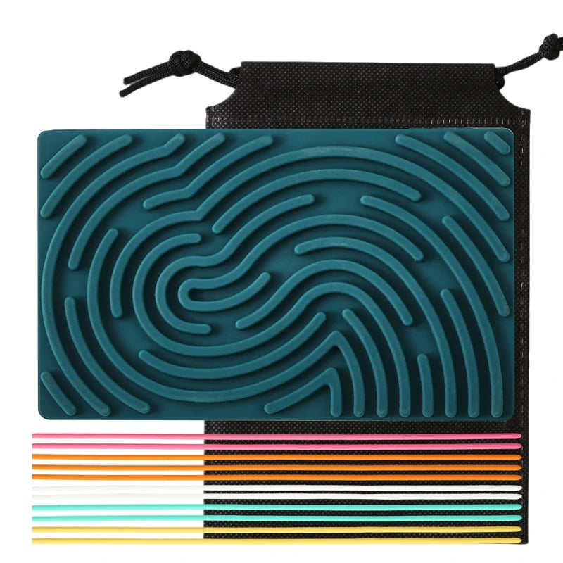 A green Silicone Montessori Sensory Activity Board Fidget Toy for Kids rests on a black pouch, with ten colorful tracing sticks—ideal for anxiety relief and mindfulness through hands-on learning.