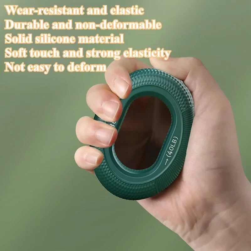 A hand squeezes a green Silicone Grip Trainer Ring for Hand Strengthening and Wrist Rehabilitation, highlighting its wear-resistant and elastic qualities. With a soft touch and strong elasticity, it offers grip strength up to 40 pounds against a soothing green blurred background.
