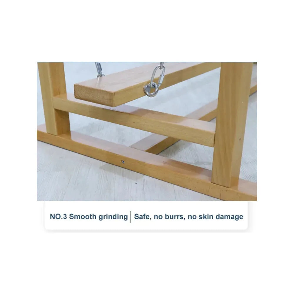 Close-up of a wooden swing frame on a light-colored floor. A wooden seat hangs by chains, resembling an indoor balance beam. Text reads: NO.3 Smooth grinding | Safe, no burrs, no skin damage. Ideal for sensory system training with the Indoor Wooden Balance Beam for kids 3-12 years.