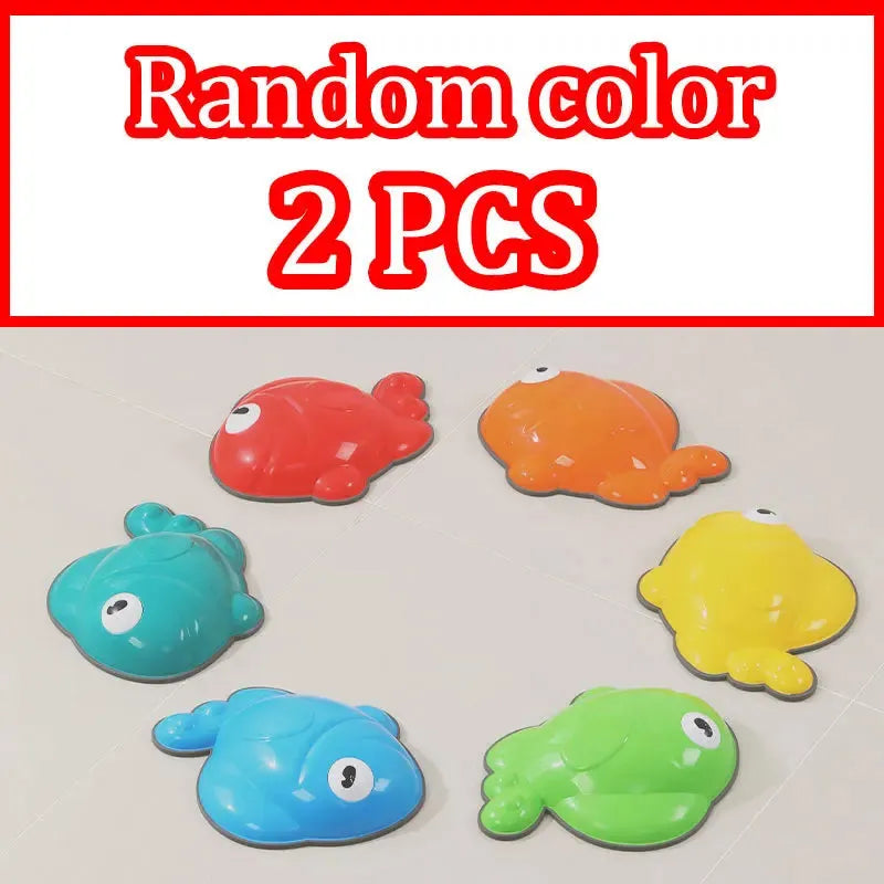 Six vibrant fish-shaped toys from the Montessori Sensory Integration Foot Toys set are arranged in a circle. The bold red text above reads Random color 2 PCS. Available in blue, red, orange, yellow, and green for enhancing sensory learning in children aged 3-6.