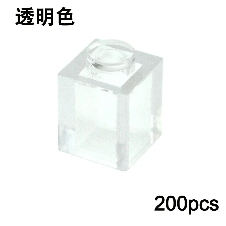 A transparent 1x1 building block from the MOC Transparent Bulk Brick Set, compatible with Lego, is shown on a white background with Chinese text at the top left and 200pcs at the bottom right, perfect for any collection.