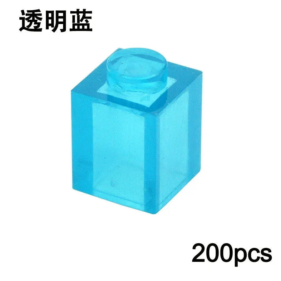 A MOC Transparent Bulk Brick Set (1x1, 1x2, 1x4, 2x4) in Transparent Blue 2 is shown. Chinese text appears at the top left and 200pcs in black at the bottom right—ideal for expanding your clear building block collection.
