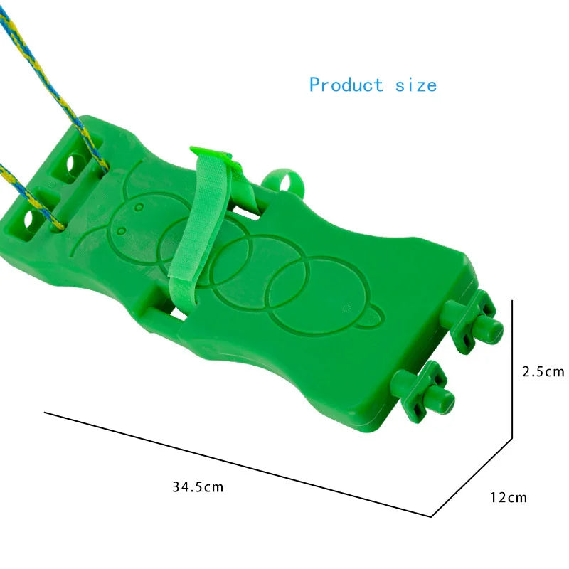 An Interactive Outdoor Balance Board Seesaw for Kids designed as a green plastic caterpillar with strap and rope. Ideal for sensory training, it measures 34.5 cm long, 12 cm wide, and 2.5 cm high.