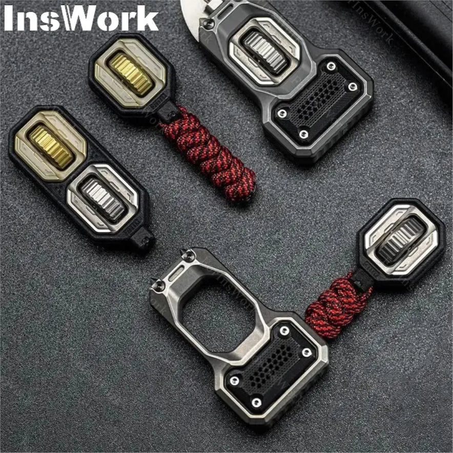 Four Ammo Cracker Unzip Roller Fidget Toy Stress Relief Slider EDC Tools, two with red paracord lanyards, are arranged on a dark textured surface. InsWork appears in the top left corner.