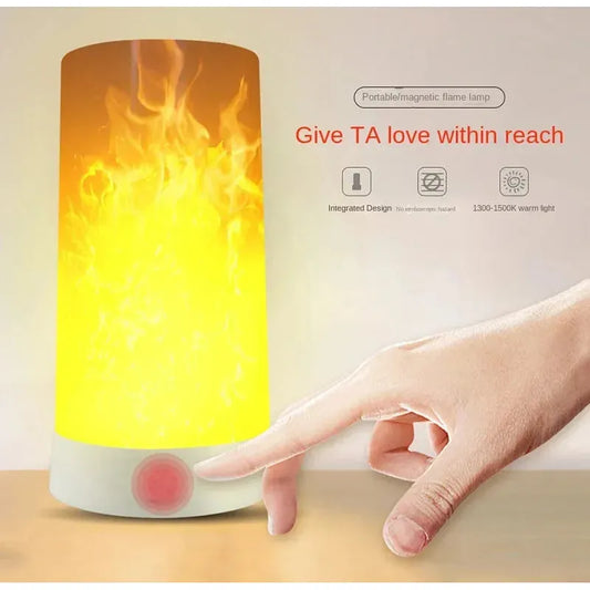 A hand reaches for the button on the Simulated Flame LED Night Light, showcasing its lifelike flickering flame. The phrase Give TA love within reach emphasizes its portability and cozy ambiance—ideal for creating a warm atmosphere anywhere.