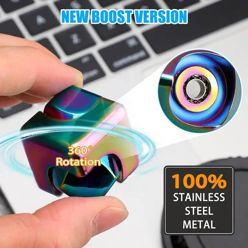 A hand holds the Infinity Gear Cube Spinner Antistress Toy in front of a laptop. Text highlights its NEW BOOST VERSION, crafted from 100% stainless steel with quality workmanship from Mainland China.