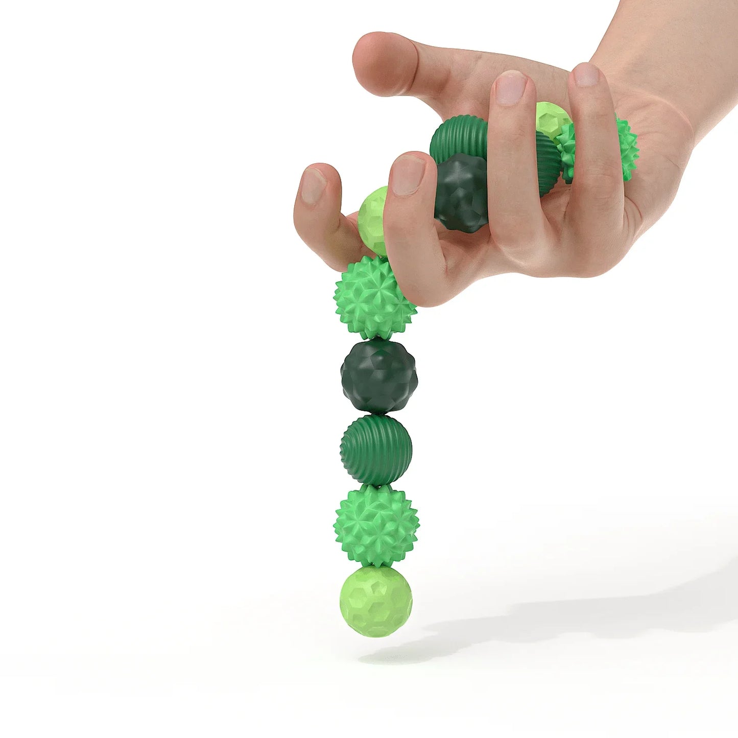 A hand holds textured green balls—part of the 4Pcs 8PCS Silicone Magnetic Balls Set for Adults—unique silicone fidget toys designed to calm restless hands and an anxious mind, shown against a white background.