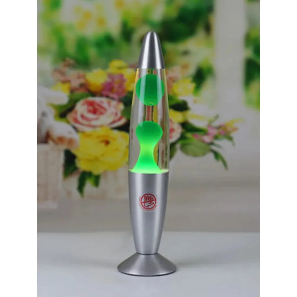 The Luminous Volcano Lava Jellyfish LED Night Light features neon green wax forming a flowing hourglass shape against a floral background. Its polished metallic base and 25W creative design enhance the relaxing atmosphere, making it perfect for home decor.