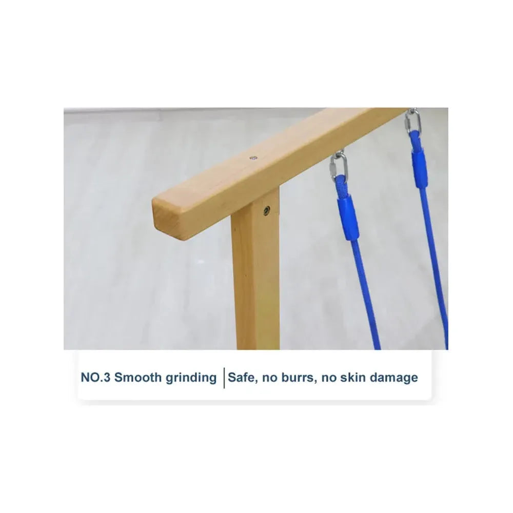 Close-up of an Indoor Wooden Balance Beam Sensory Training Toy for Children 3-12 Years, with metal hooks on blue cords. Caption: NO.3 Smooth grinding | Safe, no burrs, no skin damage. The plain light-colored floor is the background. Ideal for sensory system training exercises.