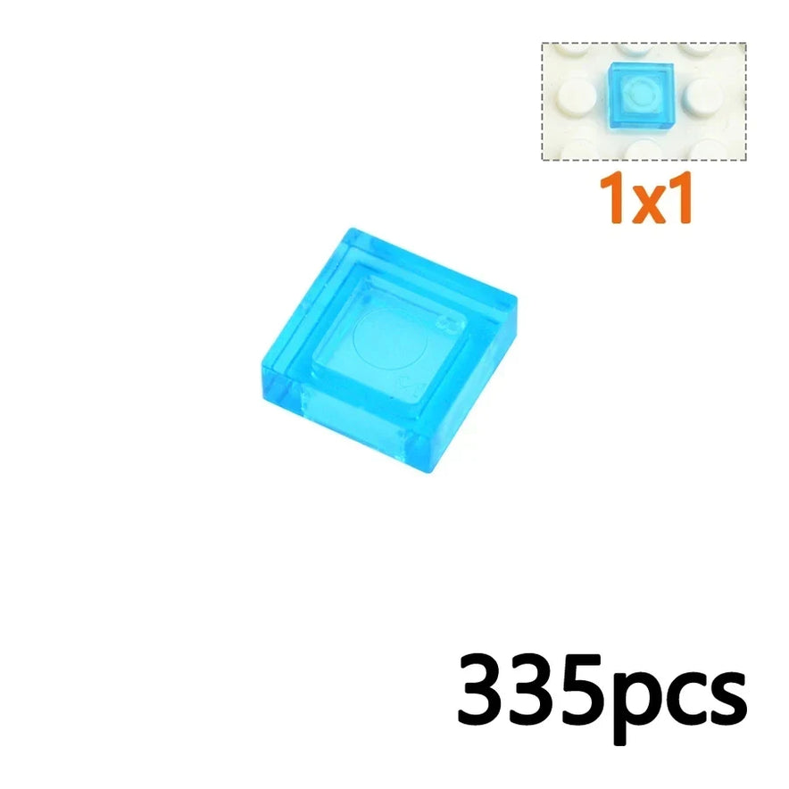 A close-up shows a 3070-Light Blue 1x1 MOC Transparent Bulk Brick from the Clear Building Block Set (compatible with Lego), 335pcs at bottom right. An inset highlights the tile placed between two white blocks.