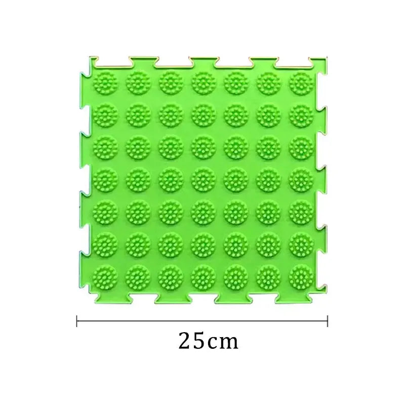 The Montessori Sensory Integration Training Balance Stone is a square green foam mat, featuring interlocking edges and raised circular bumps. It measures 25cm on each side and is perfect for sensory toy sets in Montessori educational toys for tactile stimulation.