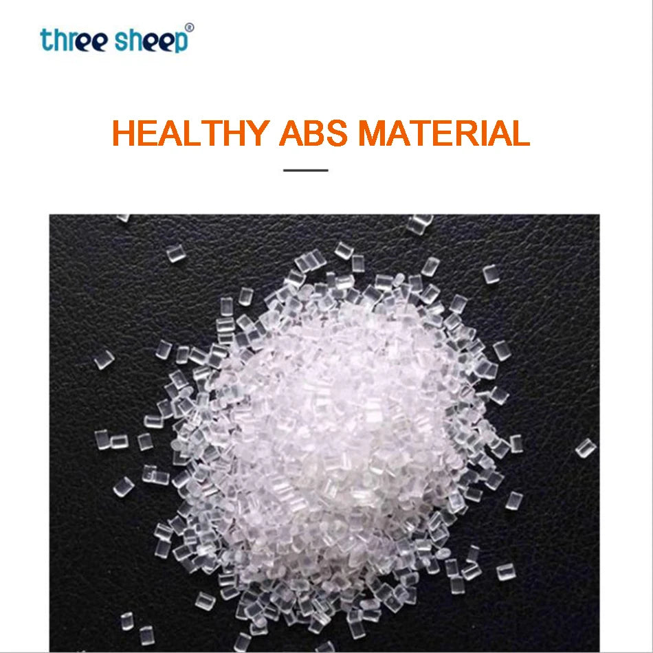 A pile of small, transparent ABS plastic pellets scattered on a dark surface with HEALTHY ABS MATERIAL in orange and three sheep in blue text, suggesting its use in crafting peaceful environments like the Smart Baby Sleep Helper: White Noise Machine with Voice Sensor for Infants.