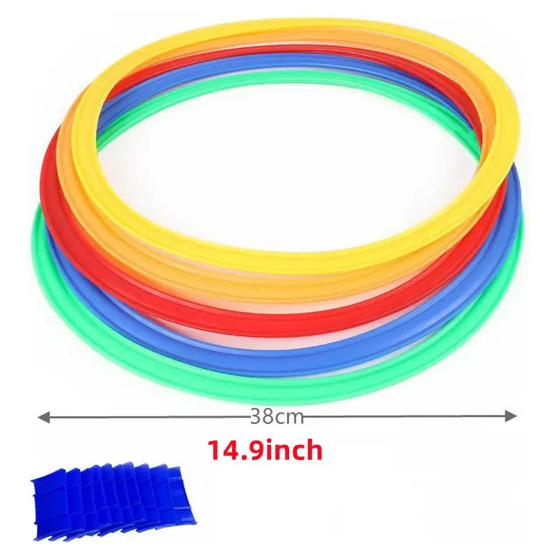 The Family Fun Jumping Game for Kids features a colorful set of circular hoops in yellow, red, blue, and green. Ideal for outdoor play and educational benefits, it includes a scale indicating 38 cm (14.9 inches) and a small stack of blue connectors in the bottom left corner.