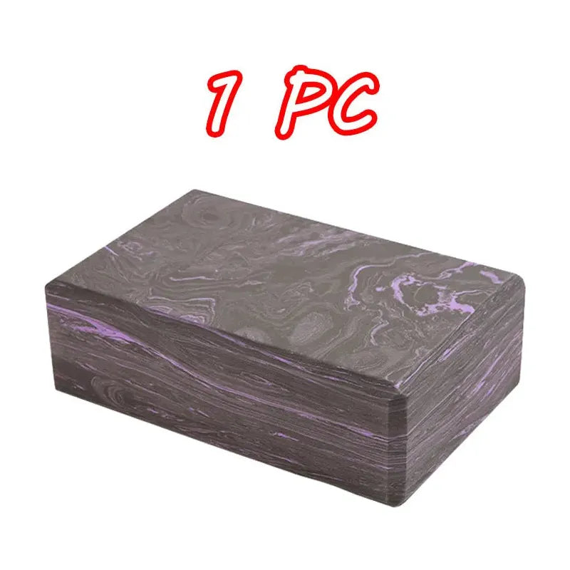 The gray-purple marbled rectangular block, resembling a Montessori Balance Stone, has 1 PC in red above it, suggesting its use in outdoor sports or as a unique sensory toy. Product: Montessori Sensory Balance Stones for Outdoor Play and Integration Activities.