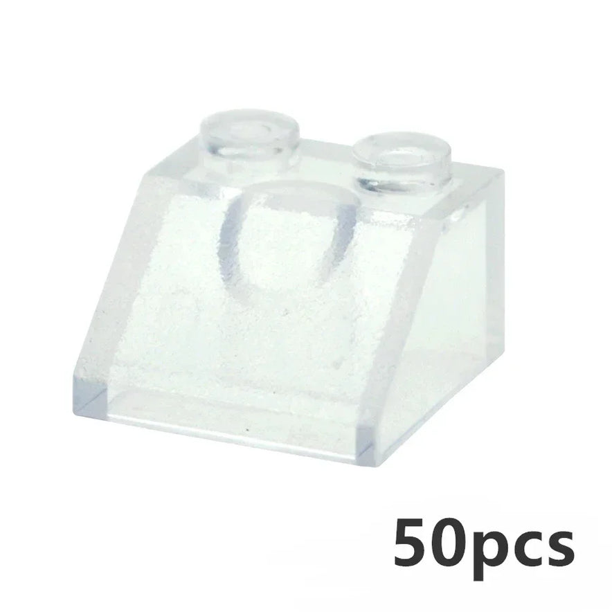 The MOC Transparent Bulk Brick Set includes 50 clear white LEGO-compatible bricks (1x1, 1x2, 1x4, 2x4), ideal for building walls or houses—displayed in bulk against a white background.