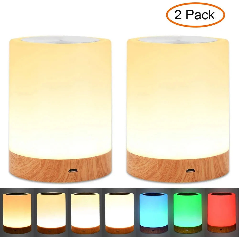 Two touch-sensitive LED lamps with wooden bases feature warm yellow lights and USB charging. Six images show rechargeable RGB night lights in orange, yellow, white, blue, green, and red. Text reads 2 Pack.