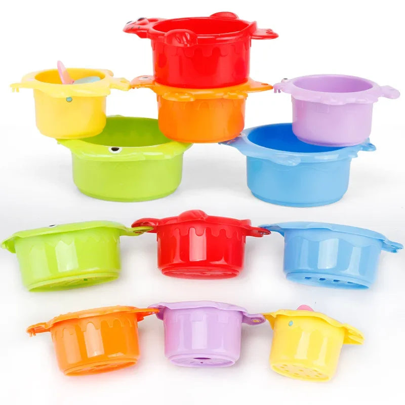 The 6Pcs Baby Bath Toy Stacking Cup set features colorful nesting cups with handles in bright red, yellow, green, blue, orange, and purple. Some have playful faces and perforated bottoms for educational fun during bath time or at the beach. Perfect as gifts for toddlers!.