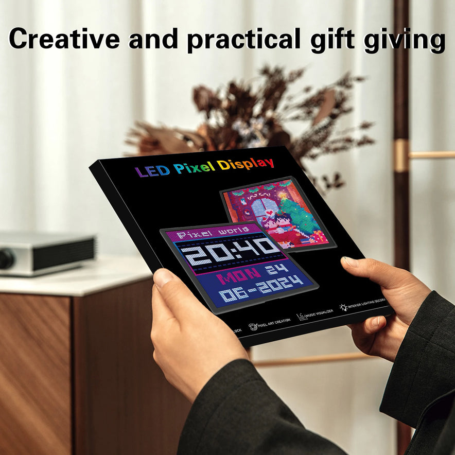 A person holds a LED Pixel Display 64x64 RGB LED Matrix Panel, showing pixel art and a clock. Text above reads Creative and practical gift giving. This programmable screen with Bluetooth app control adds charm to any room or table.