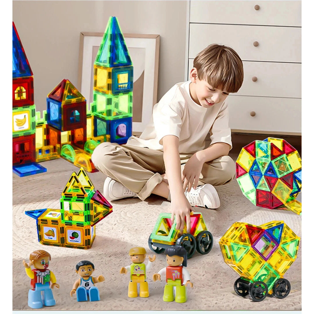 A child explores STEM learning on the floor with the Romboss Magnetic Educational Architecture Puzzle, using colorful building blocks to create imaginative structures and vehicles. Toy figures enliven the scene, while a dresser stands quietly in the background.