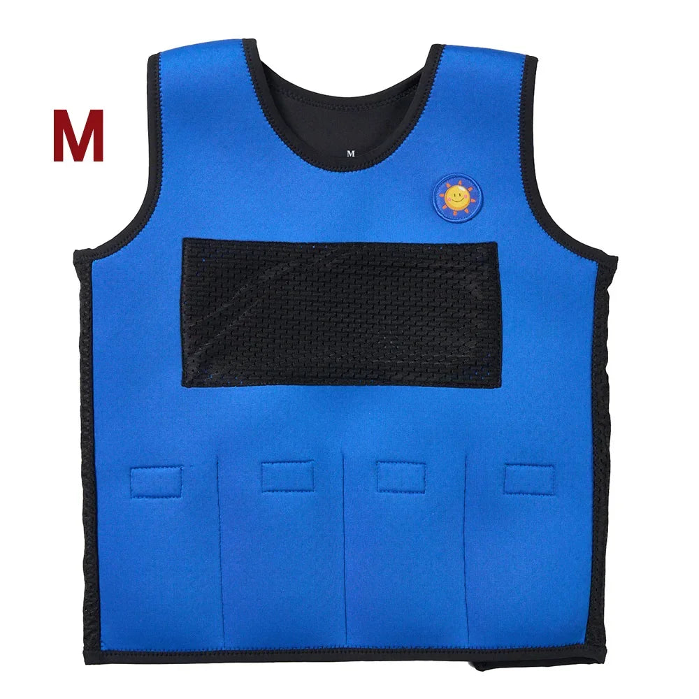 Blue breathable adjustable weight vest with black trim for stress relief. It has a large front pocket, four smaller sections, and a smiling sun logo on the right shoulder. The letter M is on the left. Designed for kids emotional comfort by Breathable Adjustable Weight Vest brand.