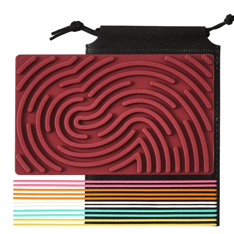 The Silicone Montessori Sensory Activity Board Fidget Toy for Kids Anxiety Relief and Mindfulness in Red Set features a raised swirl pattern and comes with 10 colorful textured sticks, all on a handy black drawstring pouch—ideal for tactile play and stress relief.