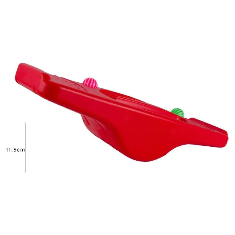 The Interactive Outdoor Balance Board Seesaw for Kids is a red plastic outdoor toy with rounded edges, featuring pink and green seats. It doubles as a sensory training tool, with an 11.5 cm height shown on a white background.