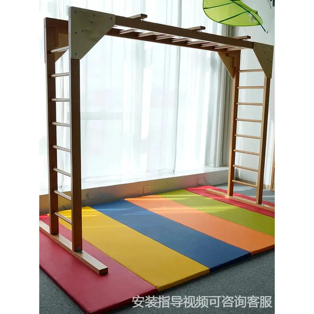 The Indoor Sensory Fitness Ladder for Kids includes wooden playground equipment with ladders and monkey bars on a vibrant foam mat in red, orange, yellow, green, and blue sections. Its located near a curtain and window with Chinese text at the bottom.