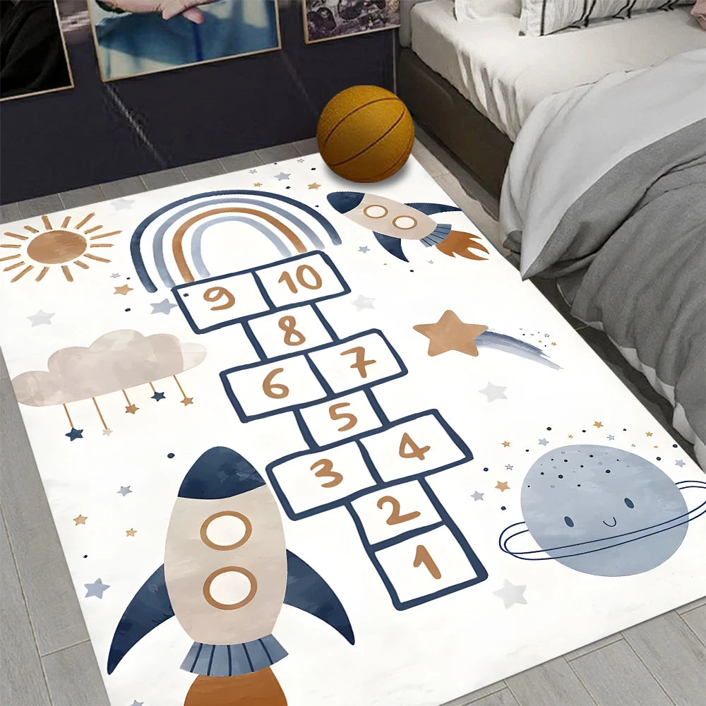 The Hopscotch Printing Carpet, a modern non-slip rug with playful space-themed illustrations, lies beside a bed with a basketball on it. This mechanical washable polyester mat is perfect for bedroom, living room, kitchen, or balcony decor.