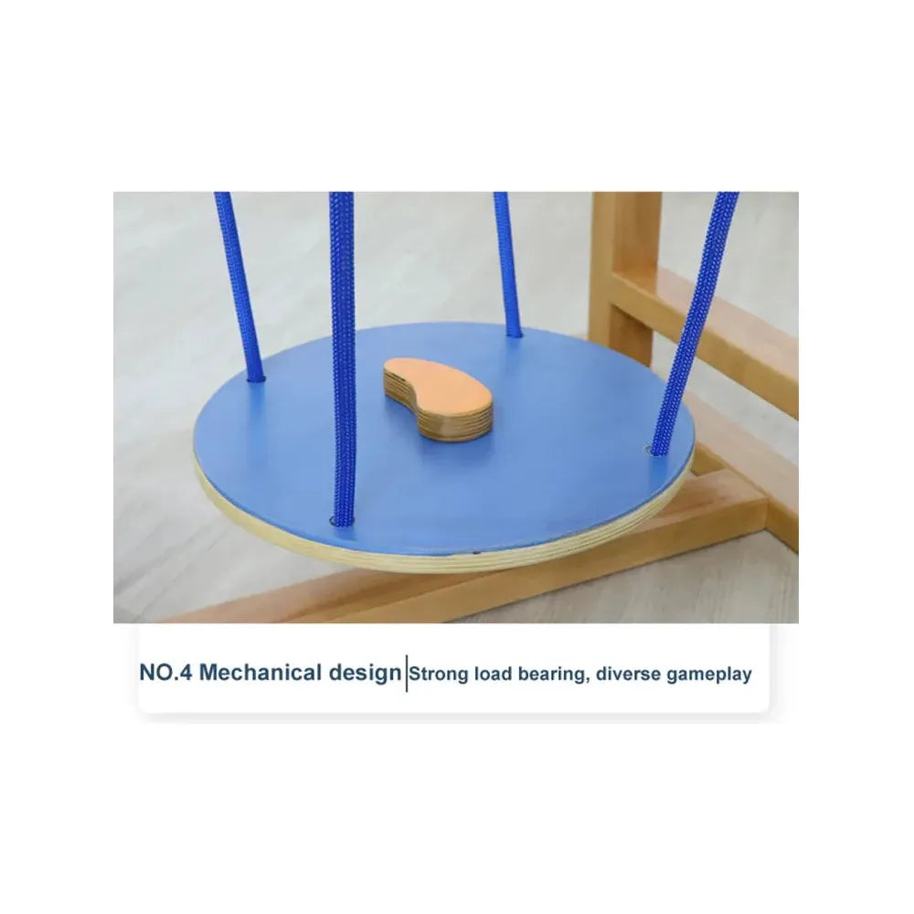 A close-up of a circular blue platform supported by four ropes attached to a wooden frame, similar to an indoor balance beam. A small curved wooden piece is on the platform. Text below reads: NO.4 Mechanical design | Strong load-bearing for sensory training, diverse gameplay.