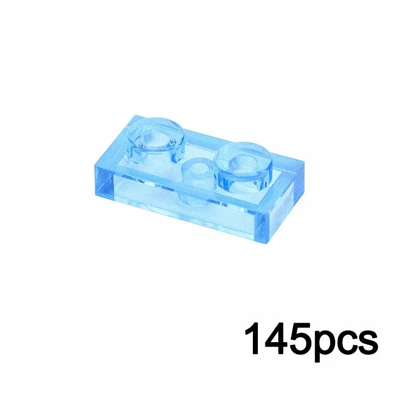 A translucent 1x2 light blue MOC brick from the Transparent Bulk Brick Set, compatible with Lego, is shown on a white background with 145pcs in black—ideal for expanding your clear building block collection.