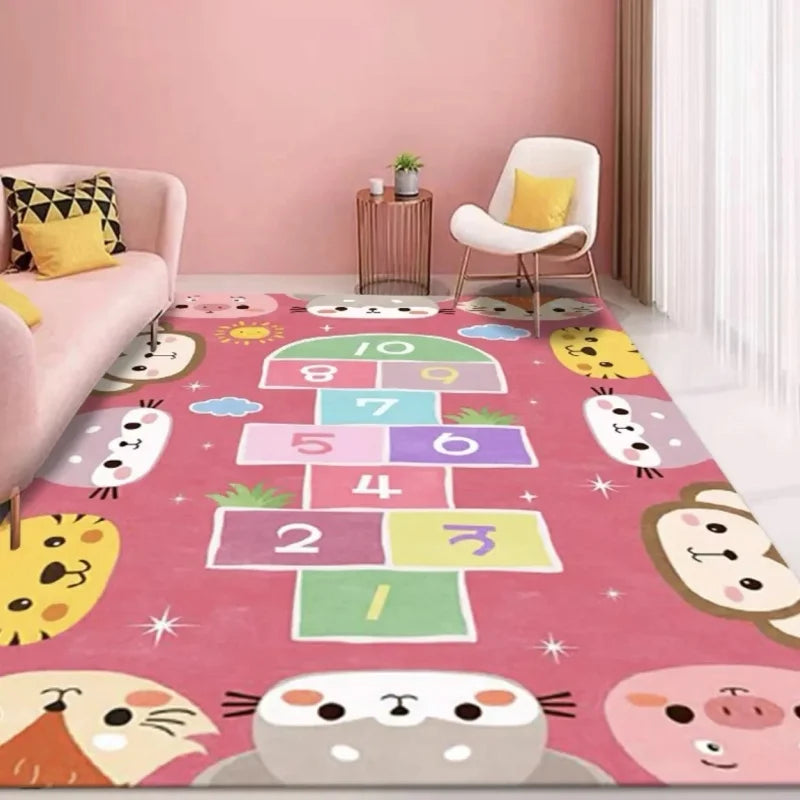 A living room with a MINISO Cartoon Hopscotch Carpet (Color 4), a pink sofa with yellow pillows on the left, a small side table with a plant, and a white chair with a yellow cushion on the right.