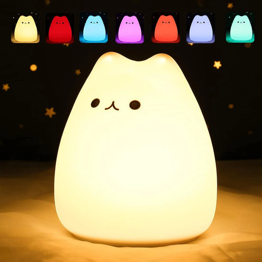 The Multicolor Cat-Shaped LED Night Light for Kids emits a warm glow with small surrounding stars on a dark background, featuring six touch sensor lamps in red, blue, purple, green, orange, and pink.