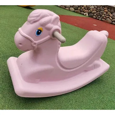 This charming toddler gift, the Monochrome Wooden Rocking Horse, boasts a cartoon face and dual head handles. Perfect for little riders, it rests on green turf with a red track and pebble border in the backdrop, making it an enchanting play area addition.
