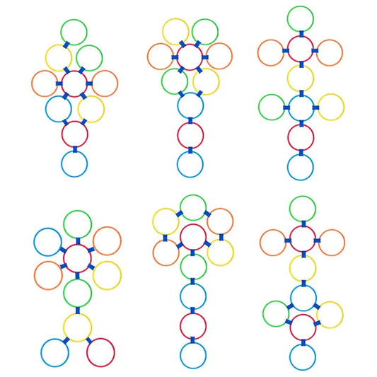The Family Fun Jumping Game for Kids features six vibrant geometric designs, forming crosses with circle connections in blue, red, orange, and green. Arranged in two rows on a white background, this interactive outdoor learning toy offers educational benefits through its symmetrical layout.