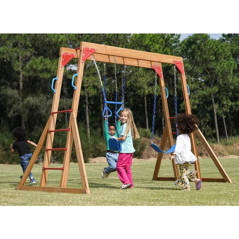 Four children enjoy the Wood Swing Sets for Backyard with Monkey Bar Playset in a grassy park, playing on swings, climbing the ladder, and using the monkey bar as trees and shrubs surround the play area.