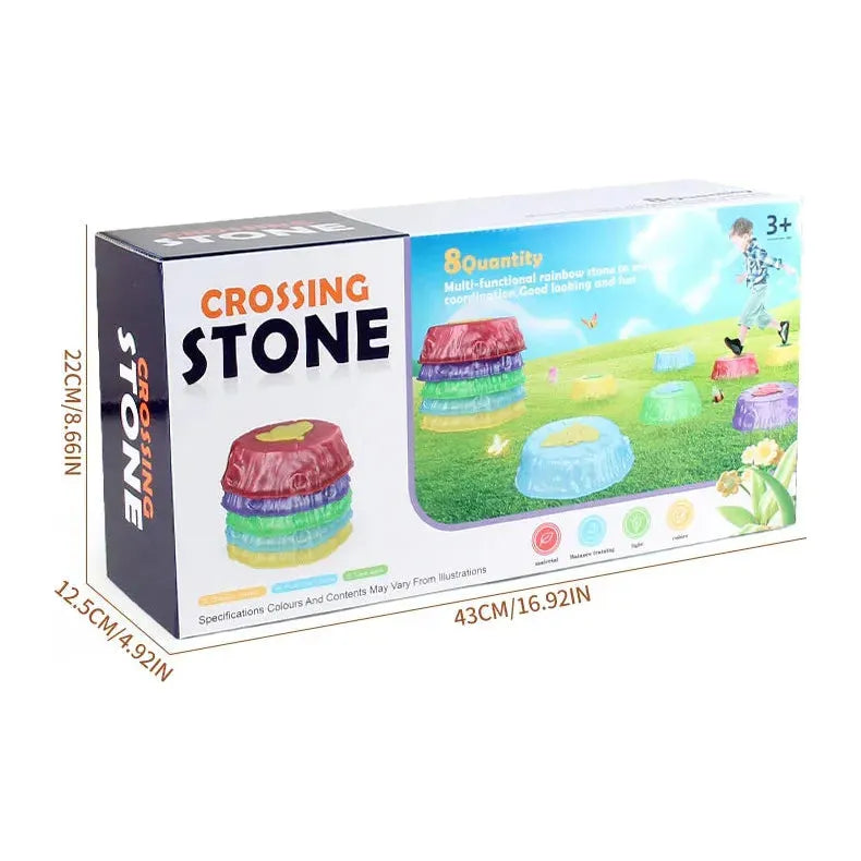 Introducing the Rainbow Luminous Balance Stones for Kids, featuring 8 vibrant stones for outdoor sensory play and balance training. Perfect for ages 3+, packaged in a 22cm x 12.5cm x 43cm box, set against a grassy field beneath a clear sky.
