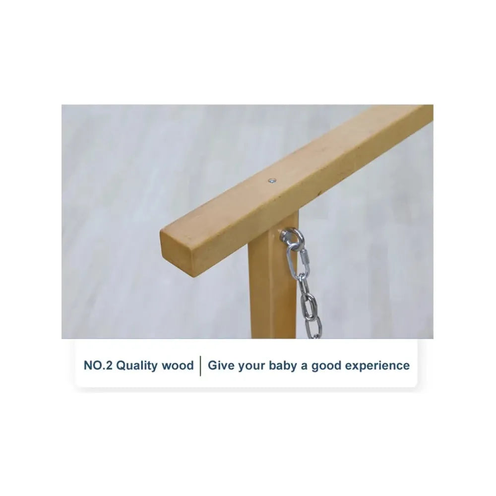 Close-up of an indoor wooden balance beam with a metal chain. Text below reads: NO.2 Quality wood | Enhance your childs sensory training experience.