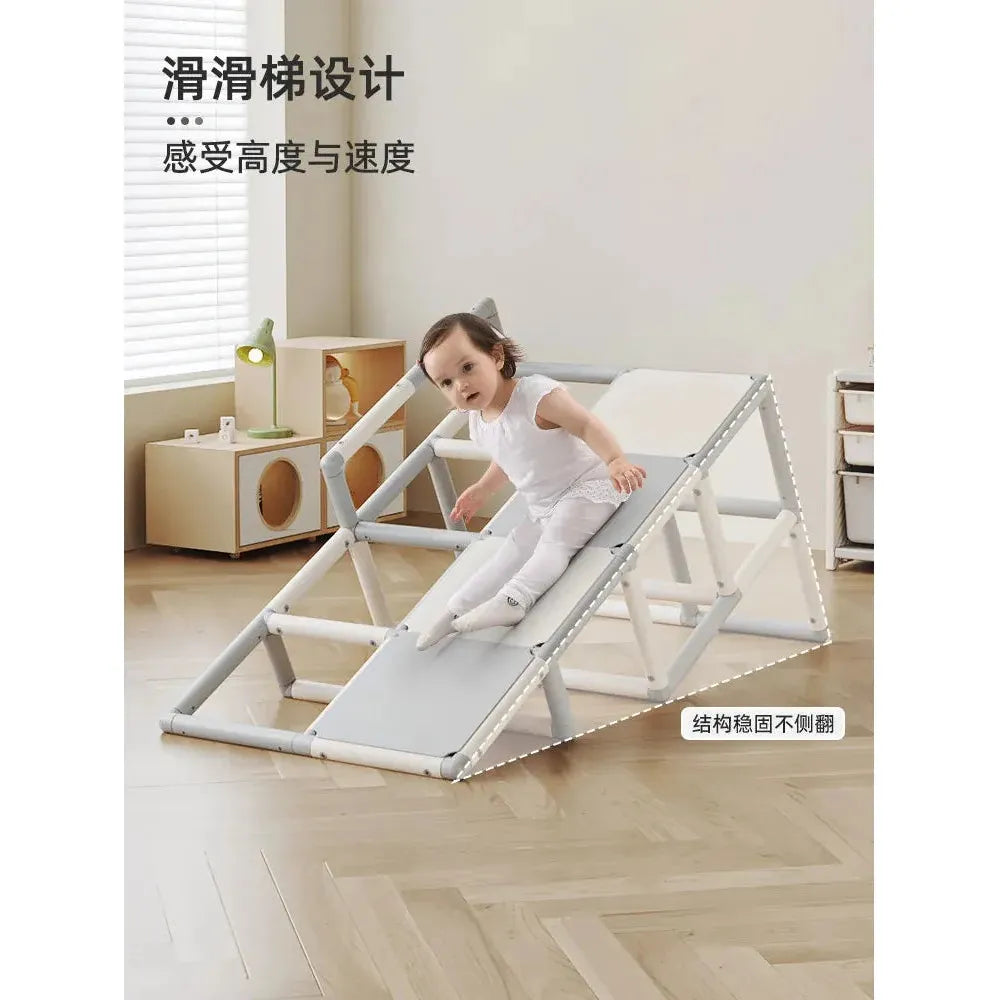 A child in a white outfit happily slides down the Indoor Climbing Adventure Set for Kids, featuring a slide, swing, and sensory play structure. The minimalist room with wooden flooring is perfect for sensory integration training. Chinese text is visible on the image.