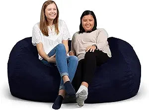 Two women smiling and sitting comfortably on a Fuf XXL Foam Filled Bean Bag Chair, Navy, 6 Feet, with a removable cover, against a white background.