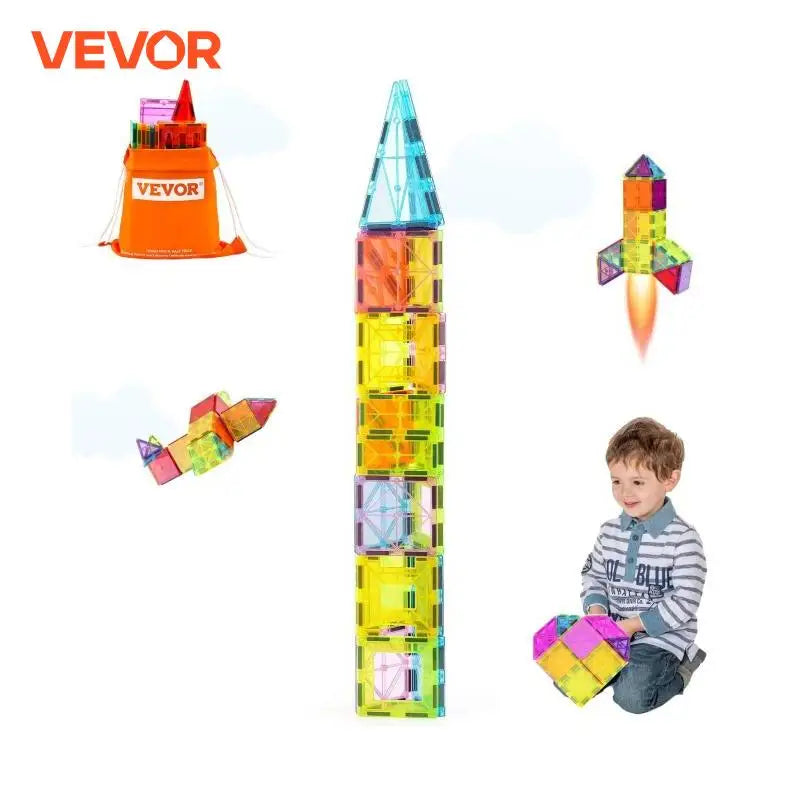 A child builds a tall tower with colorful magnetic tiles from the VEVOR 32PCS set. Nearby, blocks create a rocket. The VEVOR logo and an orange storage box are visible, showcasing this durable plastic STEM toy that fosters creativity and fun.