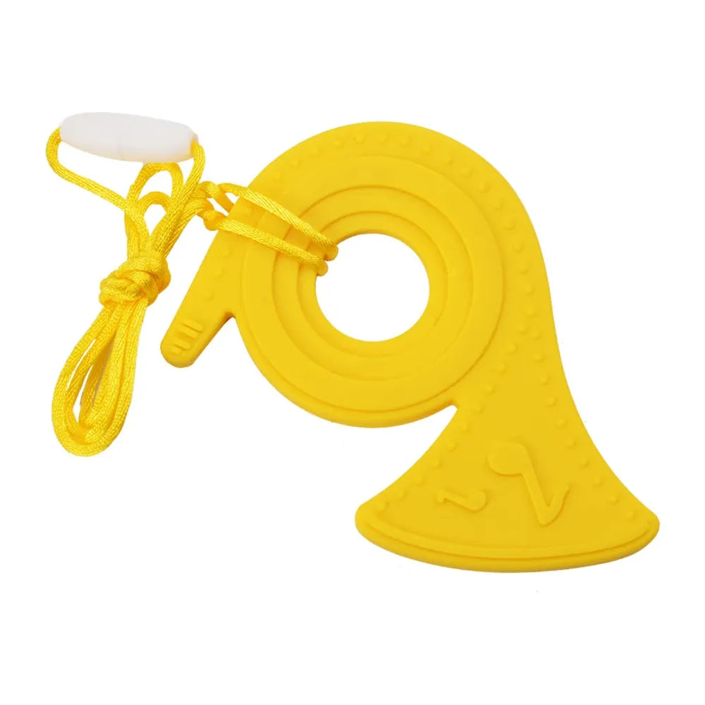 A yellow silicone chewable necklace for kids, featuring a circular center and flared shape, ideal for oral motor therapy. Its textured surface mimics a musical note or horn design, attached to a yellow lanyard with a white clasp; perfect as a sensory teether pendant for autism and ADHD.